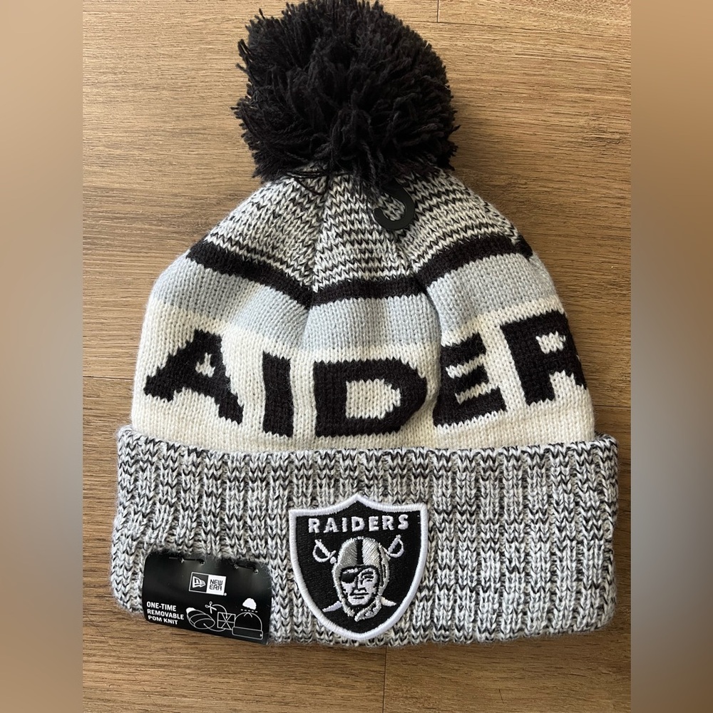 New Era Las Vegas Raiders Black and Cream Knit Unisex Beanie with Pom NFL